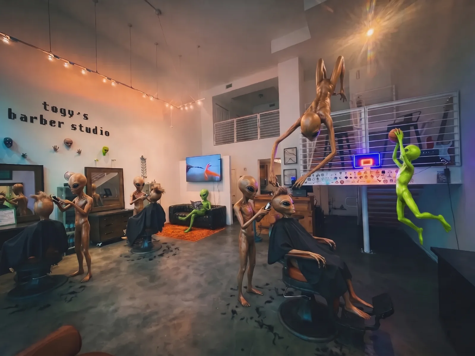 Togy's Barber Studio reimagined: aliens like the masks on the wall cut each other's hair, one hangs from the loft and one dunks on the neon hoop